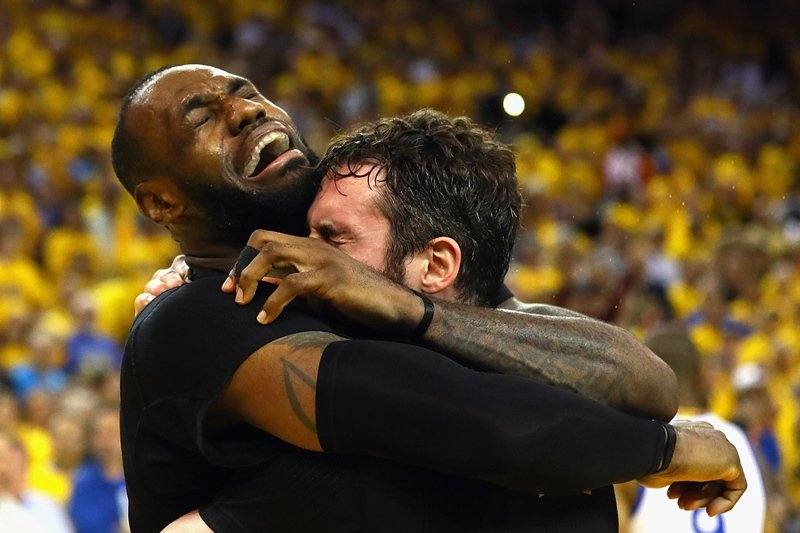 lebron james l and kevin love celebrate at oracle arena on june 19 2016 in oakland california photo afp