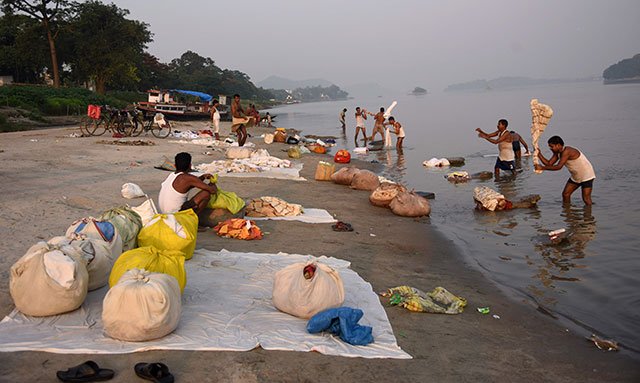 by the time the working day begins in northeast india on the longest day of the year the sun is already high in the sky and the heat is nearing its peak    because clocks across the vast country are set to the same hour photo afp