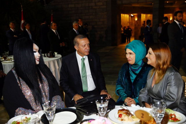this handout photo released by the turkish presidential press office on june 19 2016 shows turkish president recep tayyip erdogan 2nd r his wife emine erdogan 2nd l turkish trans celebrity and actress bulent ersoy l and turkish singer sibel can r attending a ramandan dinner in istanbul president recep tayyip erdogan shared a ramadan dinner with turkey 039 s best known transgender celebrity hours after the istanbul riot police broke up an lgbt rally photo afp this handout photo released by the turkish presidential press office on june 19 2016 shows turkish president recep tayyip erdogan 2nd r his wife emine erdogan 2nd l turkish trans celebrity and actress bulent ersoy l and turkish singer sibel can r attending a ramandan dinner in istanbul president recep tayyip erdogan shared a ramadan dinner with turkey 039 s best known transgender celebrity hours after the istanbul riot police broke up an lgbt rally photo afp