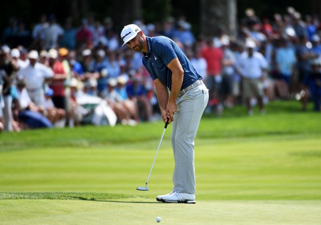 dustin johnson putts for eagle on the second hole during the final round of the us open at oakmont country club on june 19 2016 in oakmont pennsylvania photo afp dustin johnson putts for eagle on the second hole during the final round of the us open at oakmont country club on june 19 2016 in oakmont pennsylvania photo afp