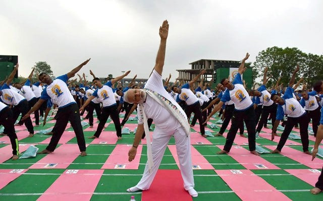 in this photograph released by the indian press information bureau pib on june 21 2016 indian prime minister narendra modi takes part in a yoga demonstration at the capitol complex in chandigarh photo afp in this photograph released by the indian press information bureau pib on june 21 2016 indian prime minister narendra modi takes part in a yoga demonstration at the capitol complex in chandigarh photo afp