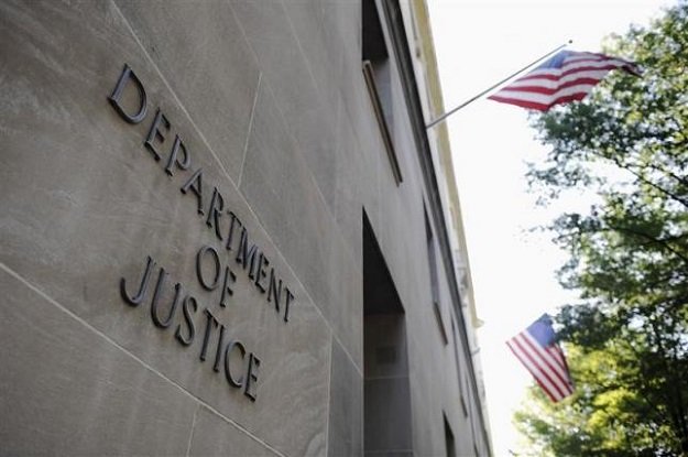 us department of justice convicts two for conspiracy photo reuters