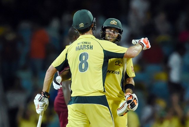 australian cricketer mitchell marsh 8 and his glenn maxwell celebrate their six wicket victory over west indies photo afp