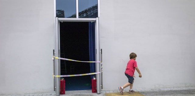 this photo taken on june 14 2016 shows a boy playing next to the auditorium at the new international french school in beijing photo afp