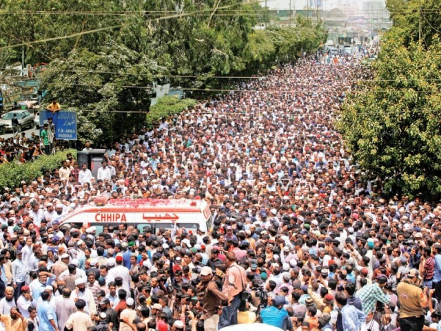 a massive crowd follows the ambulance carrying amjad sabri s coffin in liaquatabad photo reuters a massive crowd follows the ambulance carrying amjad sabri s coffin in liaquatabad photo reuters