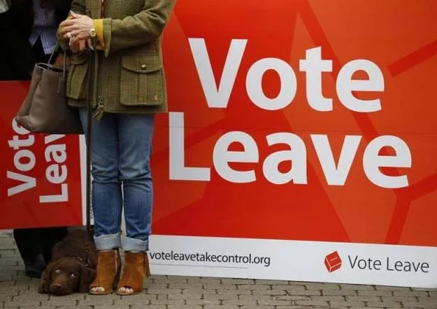 a supporter stands by a sign at the launch of the vote leave bus campaign in favour of britain leaving the european union in truro britain may 11 2016 photo reuters a supporter stands by a sign at the launch of the vote leave bus campaign in favour of britain leaving the european union in truro britain may 11 2016 photo reuters