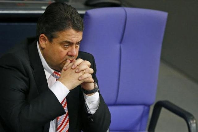 german economy minister and vice chancellor sigmar gabriel sits beside the empty chair of german chancellor angela merkel not pictured as she addresses the german lower house of parliament bundestag in berlin december 18 2013 photo reuters german economy minister and vice chancellor sigmar gabriel sits beside the empty chair of german chancellor angela merkel not pictured as she addresses the german lower house of parliament bundestag in berlin december 18 2013 photo reuters