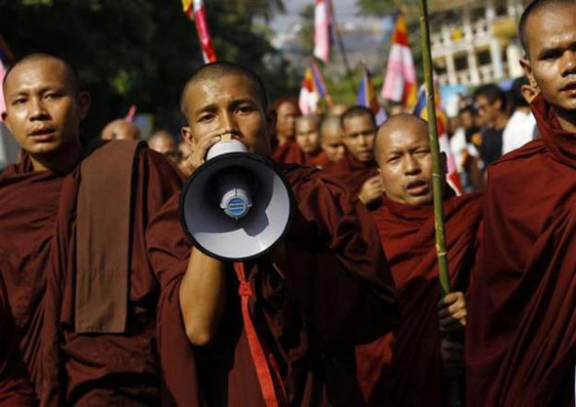 buddhist monks take part in a protest in support of demonstrators who were injured during a copper mine riot in yangon december 12 2012 photo reuters file buddhist monks take part in a protest in support of demonstrators who were injured during a copper mine riot in yangon december 12 2012 photo reuters file