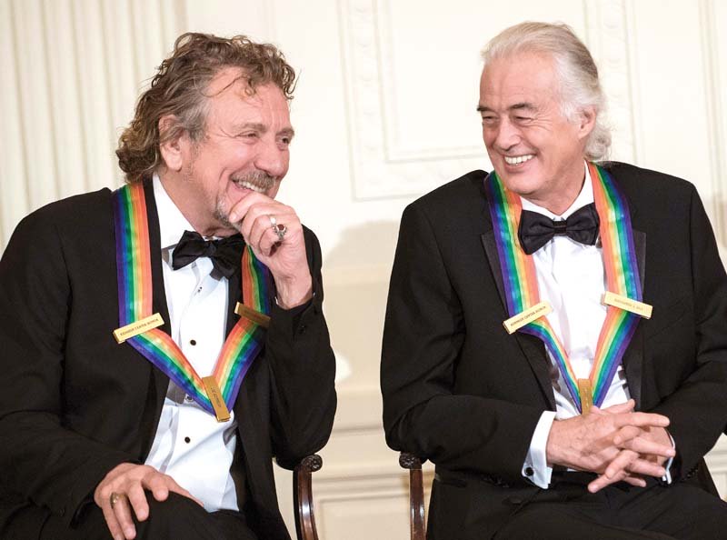 led zeppelin band members robert plant l and jimmy page during an event at the white house in washington dc for the 2012 kennedy center honorees photo afp