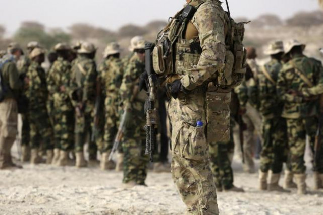 a us special forces soldier stands in front of chadian soldiers during flintlock 2015 photo reuters a us special forces soldier stands in front of chadian soldiers during flintlock 2015 photo reuters
