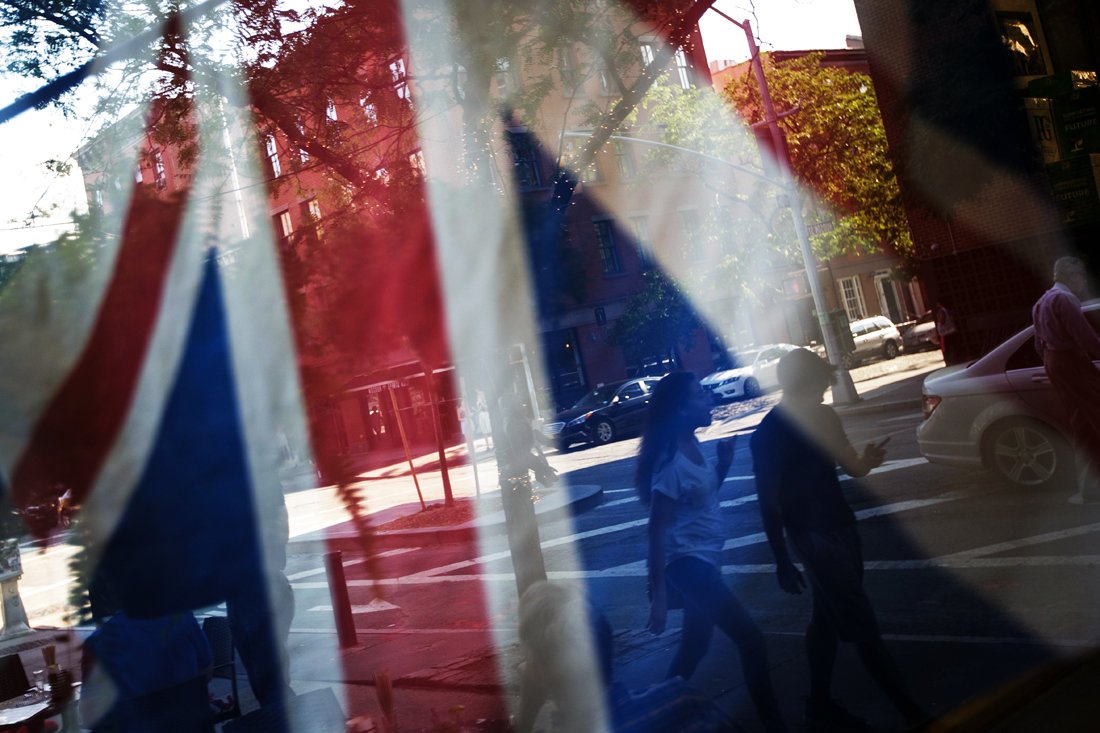 a british flag hangs in the window of myers of keswick a british grocery store june 24 2016 in new york city photo afp