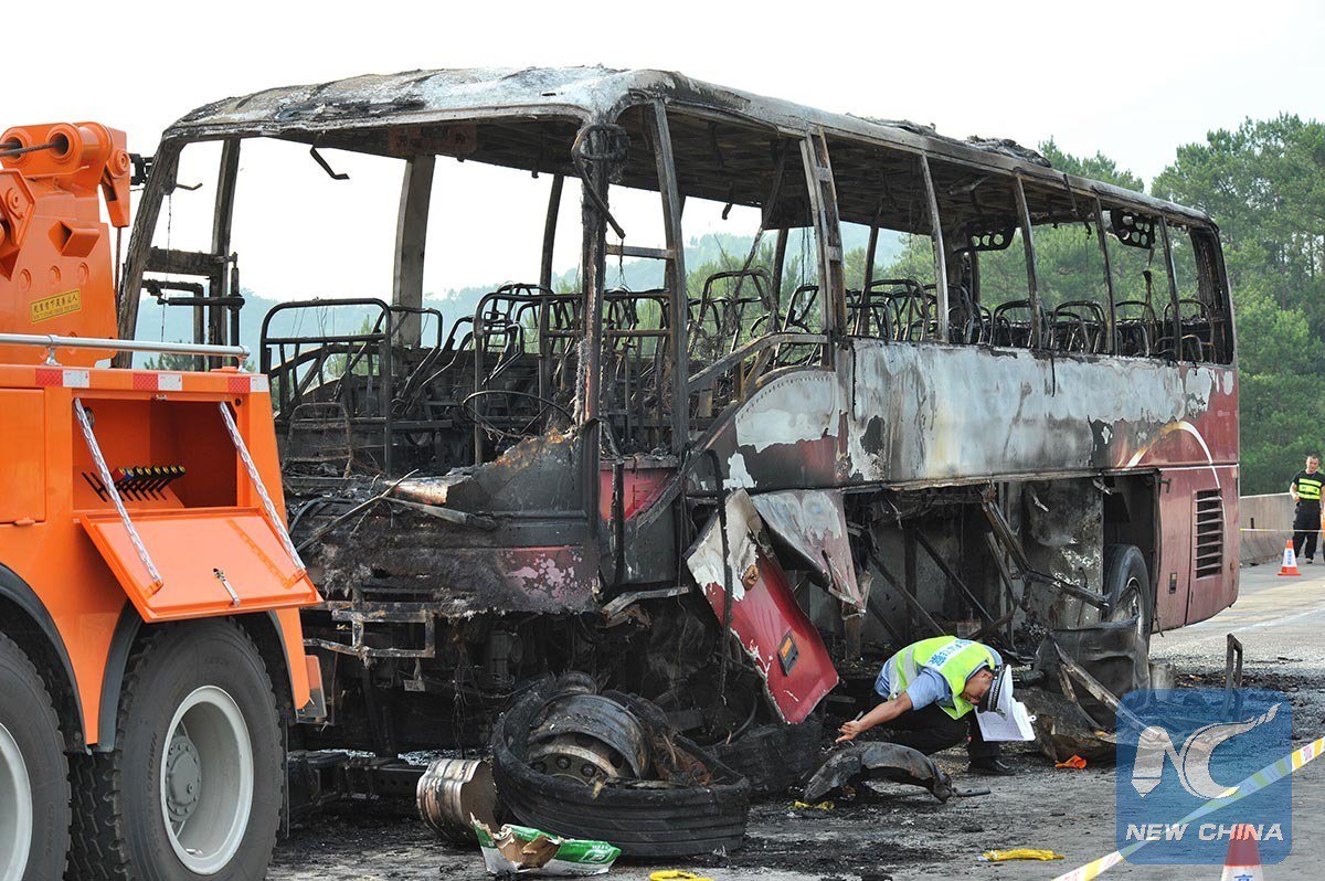the charred body of the bus that caught fire killing at least 30 people photo twitter xhnews