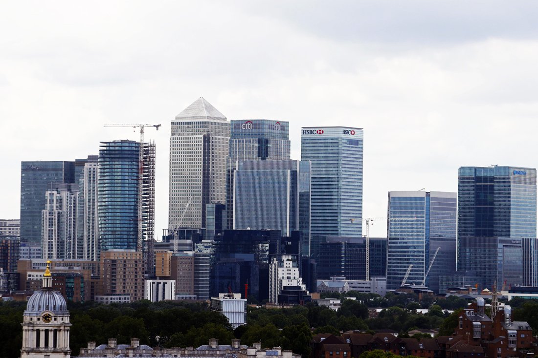 the canary wharf finance district of london encompasing the offices of hsbc citigroup jpmorgan chase and other global banking corporations is pitcured from greenwich park in south east london on june 26 2016 photo afp