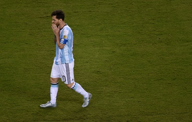 lionel messi walks after missing his shot during the penalty shoot out against chile during the copa america centenario final in east rutherford new jersey united states on june 26 2016 photo afp