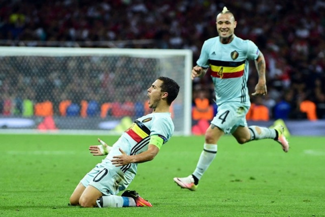 eden hazard l celebrates after scoring his team 039 s third goal at the stadium municipal in toulouse on june 26 2016 photo afp eden hazard l celebrates after scoring his team 039 s third goal at the stadium municipal in toulouse on june 26 2016 photo afp
