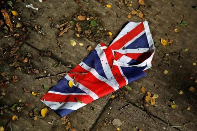 a british flag which was washed away by heavy rains the day before lies on the street in london britain june 24 2016 after britain voted to leave the european union in the eu brexit referendum photo reuters