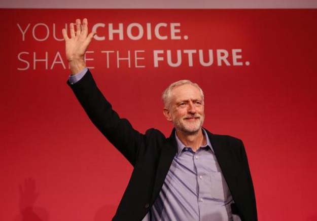 the leader of britain 039 s opposition labour party jeremy corbyn waves after making his inaugural speech at the queen elizabeth centre in central london september 12 2015 reuters