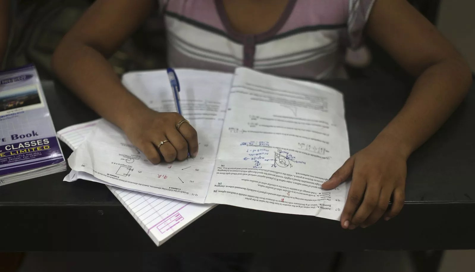 the girl was arrested soon after she attempted to take a special re test photo reuters the girl was arrested soon after she attempted to take a special re test photo reuters
