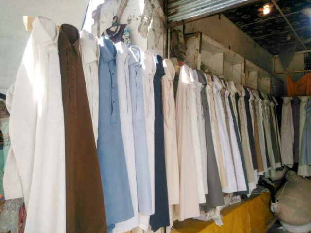 used clothes at a shop in firdous railwat phatak photo express used clothes at a shop in firdous railwat phatak photo express