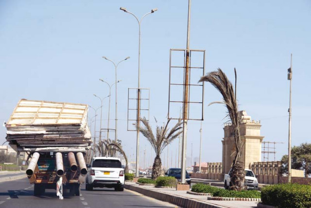 on sc orders billboards erected on public properties are being removed all over karachi including sea view road above which falls under cbc photo ayesha mir express on sc orders billboards erected on public properties are being removed all over karachi including sea view road above which falls under cbc photo ayesha mir express
