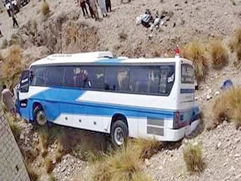 a view of the bus that fell down a ravine near khuzdar on monday photo express