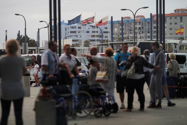 the european union the union jack gibraltarian and spanish flags are seen flying on gibraltar 039 s border with spain rear from the gibraltar international airport in the british overseas territory of gibraltar historically claimed by spain june 27 2016 after britain voted to leave the european union in the eu brexit referendum photo reuters