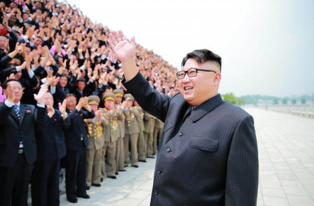 this undated picture released from north korea 039 s official korean central news agency kcna on june 29 2016 shows north korean leader kim jong un c attending a photo session with the contributors to the successful test fire of the surface to surface medium long range strategic ballistic rocket hwasong 10 at an undisclosed location photo afp this undated picture released from north korea 039 s official korean central news agency kcna on june 29 2016 shows north korean leader kim jong un c attending a photo session with the contributors to the successful test fire of the surface to surface medium long range strategic ballistic rocket hwasong 10 at an undisclosed location photo afp