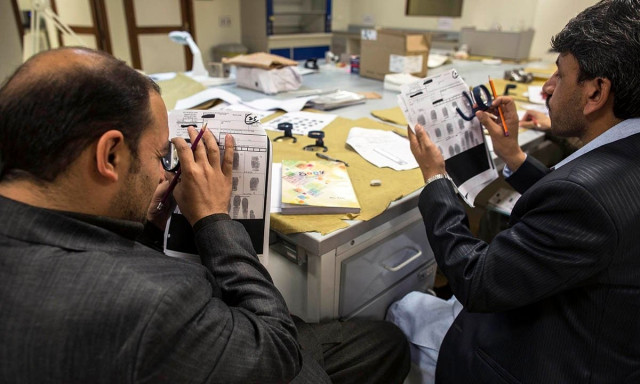 forensic scientists practise classifying fingerprints at the fingerprint department at punjab forensic science agency in lahore january 13 2015 photo reuters forensic scientists practise classifying fingerprints at the fingerprint department at punjab forensic science agency in lahore january 13 2015 photo reuters