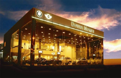 dewan farooque motors distances itself as share price surges over 100