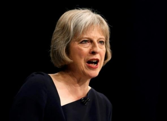 britain 039 s home secretary theresa may speaks on the third day of the conservative party conference in manchester northern britain october 6 2015 photo reuters britain 039 s home secretary theresa may speaks on the third day of the conservative party conference in manchester northern britain october 6 2015 photo reuters
