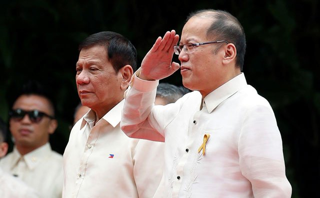 outgoing president benigno aquino salutes beside incoming president rodrigo duterte during departure honors for aquino at the malacanang palace in manila philippines june 30 2016 photo reuters