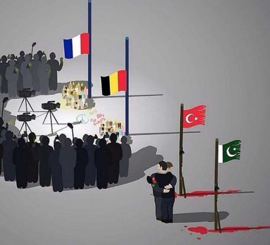 the image shows two people from pakistan and turkey consoling each other while standing next to tattered flags of their countries with blood on the floor photo twitter the image shows two people from pakistan and turkey consoling each other while standing next to tattered flags of their countries with blood on the floor photo twitter