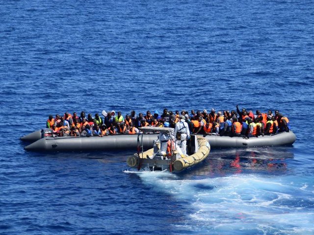 picture released by the italian navy marina militare shows a rescue operation of migrants and refugees at sea off the coast of sicily on april 11 2016 photo afp