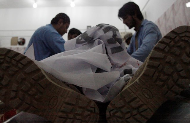 paramedics inspect the body of one of four frontier corps personnel killed by gunmen in quetta pakistan june 29 2016 photo reuters