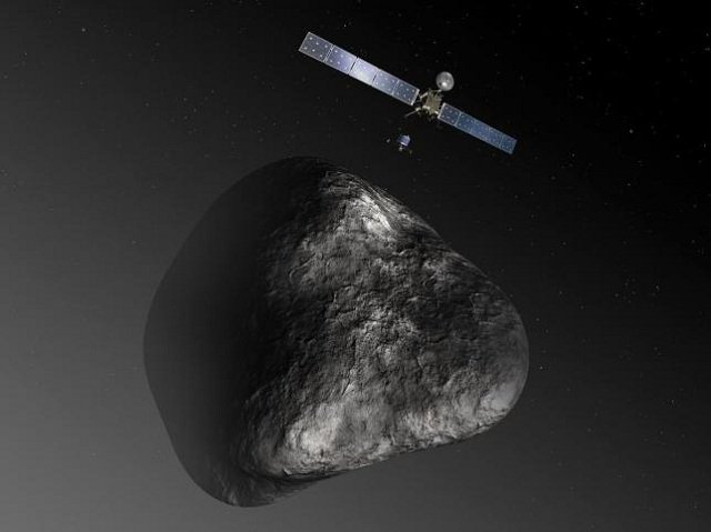 an artist 039 s impression handout image by the european space agency shows the rosetta orbiter deploying the philae lander to comet photo reuters