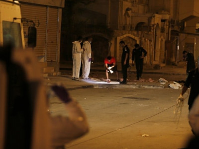 bomb shrapnel kills woman wounds 3 kids in bahrain