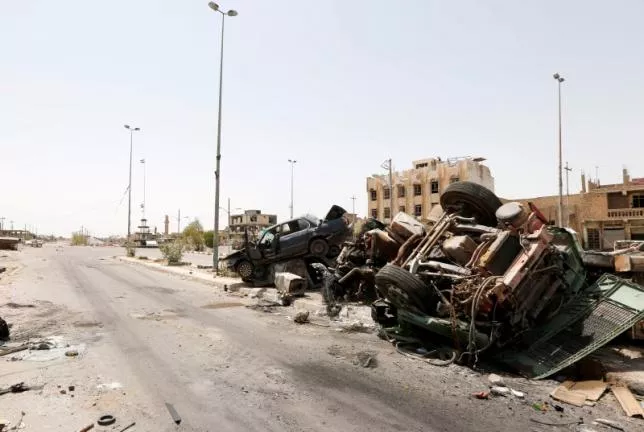 destroyed vehicles from clashes are seen in falluja iraq after government forces recaptured the city from islamic state militants june 30 2016 photo reuters destroyed vehicles from clashes are seen in falluja iraq after government forces recaptured the city from islamic state militants june 30 2016 photo reuters