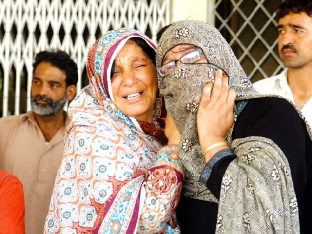 maria sadaqat s family mourn her death photo file maria sadaqat s family mourn her death photo file