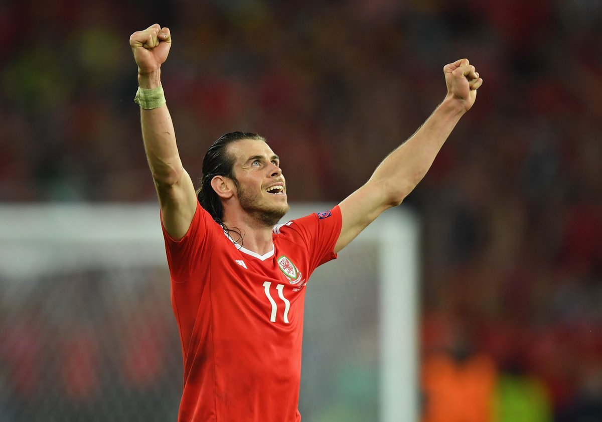 wales forward hal robson kanu l celebrates after scoring a goal with gareth bale r during the euro 2016 quarter final against belgium on july 1 2016 photo uefa