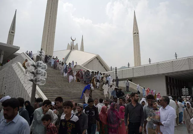 pakistani muslims leave the grand faisal mosque after offering jummat ul vida the last congregational friday prayers on july 1 2016 photo afp aamir qureshi