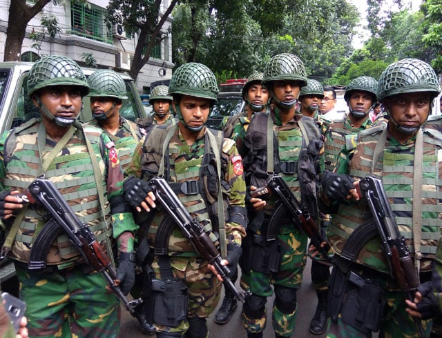 army soldiers gather near the holey artisan restaurant after militants attacked the upscale cafe in dhaka bangladesh july 2 2016 photo reuters