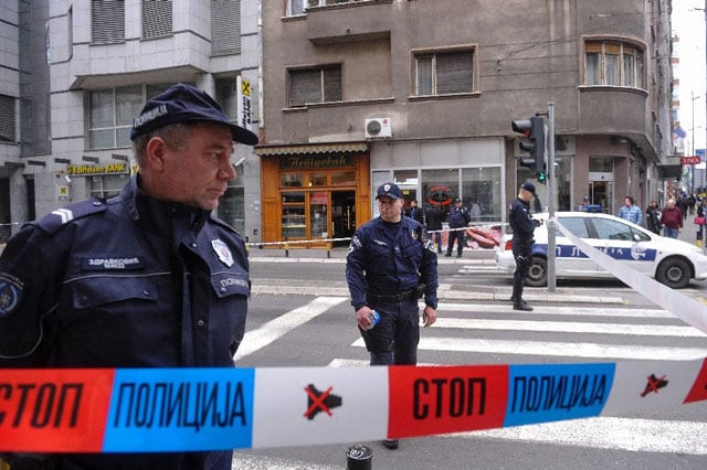 file picture shows serbian police at a crime scene in the capital belgrade photo afp file picture shows serbian police at a crime scene in the capital belgrade photo afp