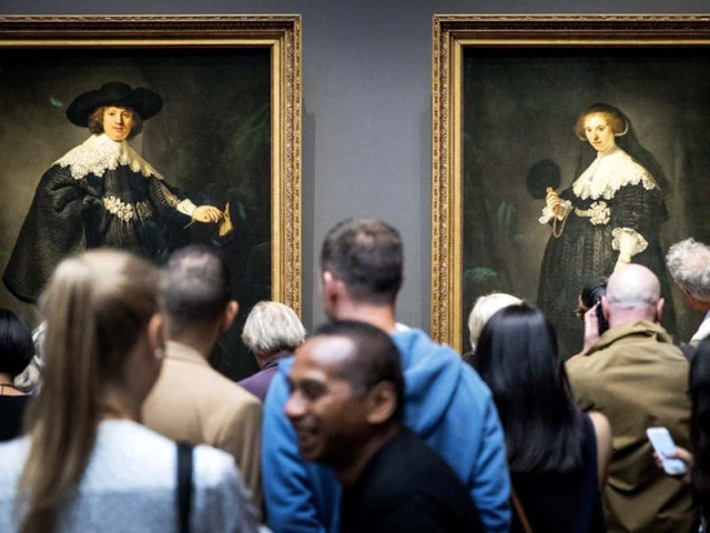 the two paintings are displayed at the rijksmuseum in amsterdam photo afp the two paintings are displayed at the rijksmuseum in amsterdam photo afp