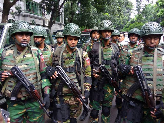 army soldiers gather near the holey artisan restaurant after militants attacked the upscale cafe in dhaka bangladesh july 2 2016 photo reuters