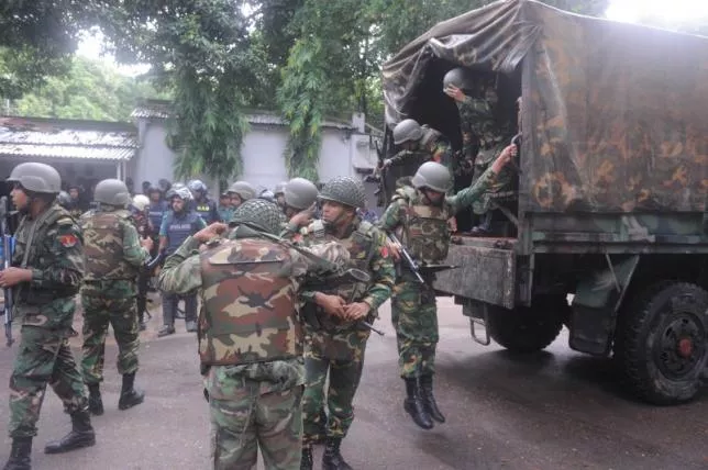 army soldiers stand on a road near the holey artisan restaurant in dhaka bangladesh july 2 2016 mahmud hossain opu handout via reuters army soldiers stand on a road near the holey artisan restaurant in dhaka bangladesh july 2 2016 mahmud hossain opu handout via reuters