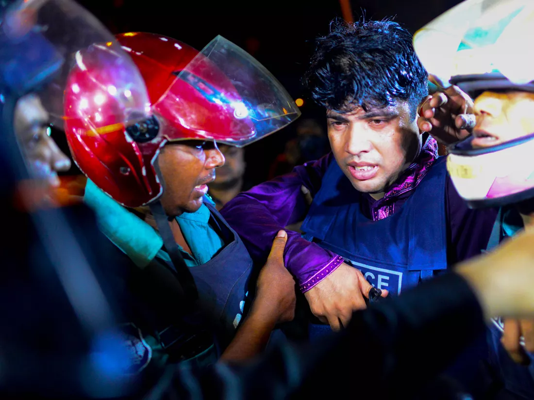 a bangladeshi policeman that was injured during an attack on an upscale restaurant is helped by others in dhaka on july 1 2016 photo afp a bangladeshi policeman that was injured during an attack on an upscale restaurant is helped by others in dhaka on july 1 2016 photo afp