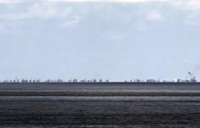 the alleged on going land reclamation of china at subi reef is seen from pagasa island thitu island in the spratlys group of islands in the south china sea west of palawan philippines may 11 2015 photo reuters the alleged on going land reclamation of china at subi reef is seen from pagasa island thitu island in the spratlys group of islands in the south china sea west of palawan philippines may 11 2015 photo reuters
