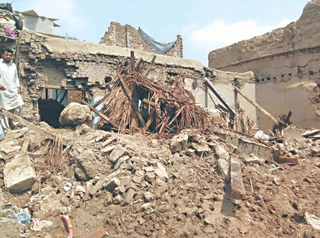 a house damaged during floods in bannu photo express a house damaged during floods in bannu photo express