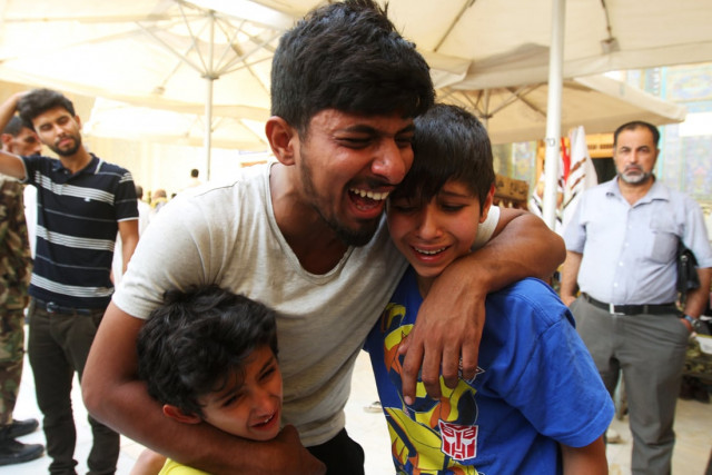 mourners react during a funeral of a victim who was killed in a suicide car bomb in the karrada shopping area in baghdad during the funeral in najaf south of baghdad iraq july 3 2016 photo reuters mourners react during a funeral of a victim who was killed in a suicide car bomb in the karrada shopping area in baghdad during the funeral in najaf south of baghdad iraq july 3 2016 photo reuters