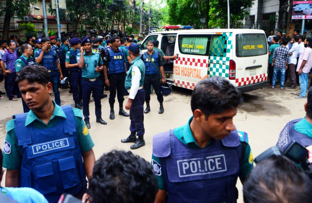 bangladeshi police man an intersection of a street leading to an upscale restaurant after a bloody siege ended in dhaka on july 2 2016 photo afp bangladeshi police man an intersection of a street leading to an upscale restaurant after a bloody siege ended in dhaka on july 2 2016 photo afp